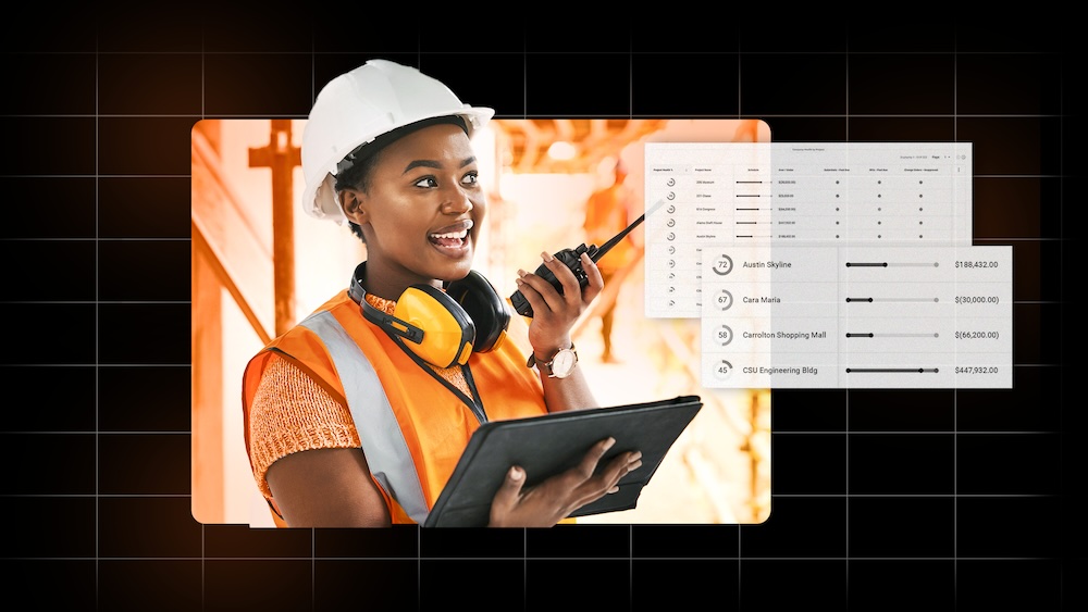 Construction project manager holding a walkie talkie and carrying a smart tablet