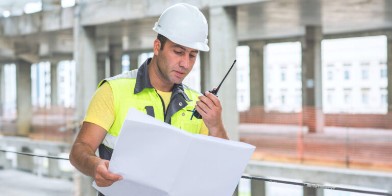 Civil engineer on a walkie talkie