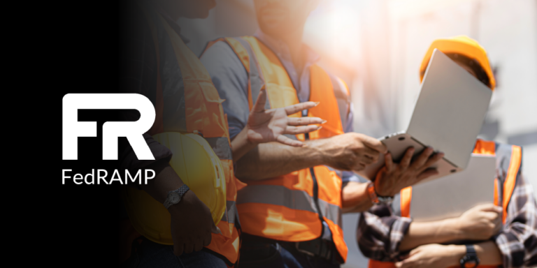 Photo of construction professionals working on a laptop with the FedRAMP logo superimposed on the left side.